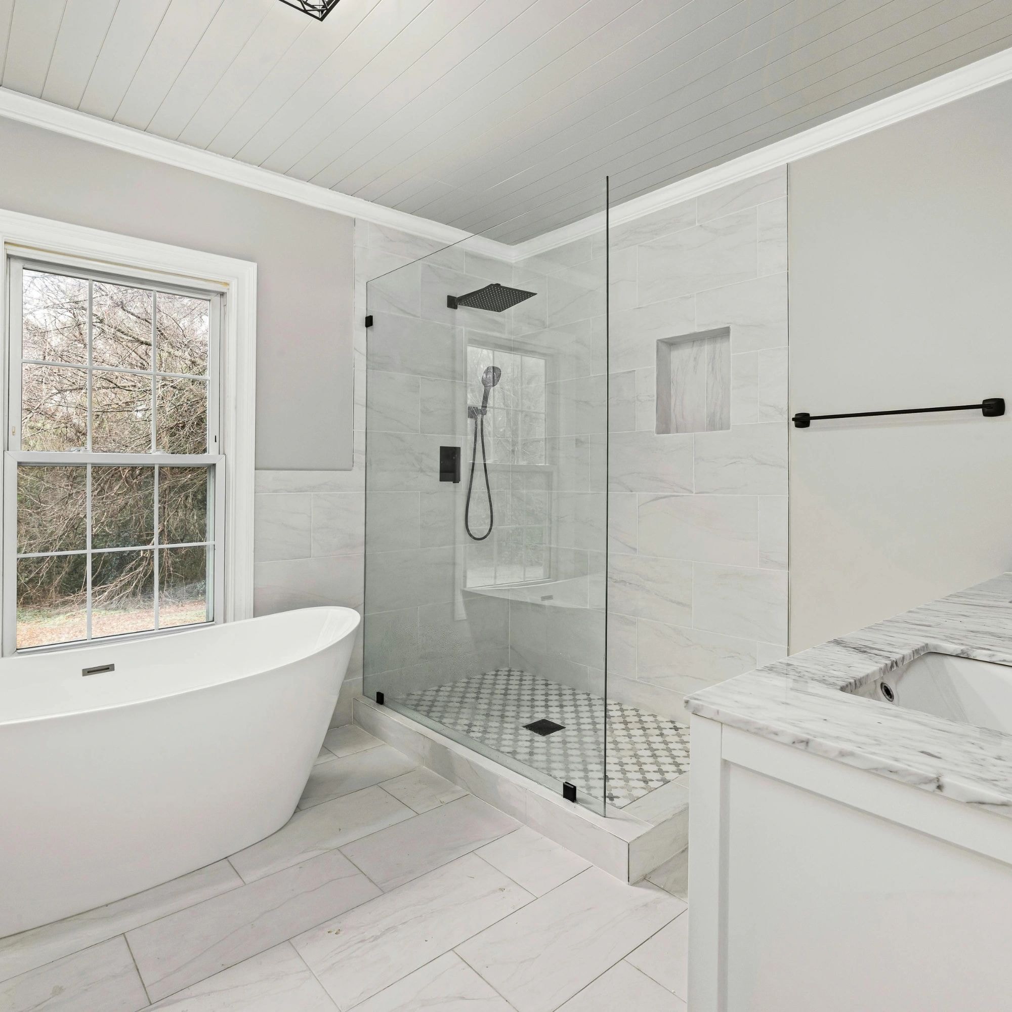 Luxurious renovated bathroom with soaking tub